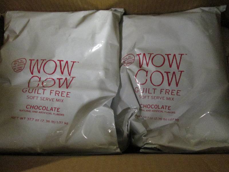 lot 299 image: 1 case of 82.36lb bags of wow cow ...