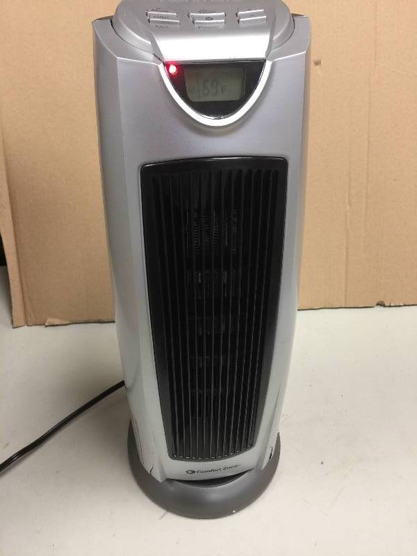 lot 8 image: Kenmore Oscillating Digital Tower Heater slight damage see pictures