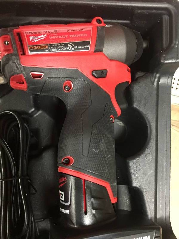 lot 57 image: Milwaukee M12 Fuel 12-Volt Lithium-Ion Brushless 14 in. Hex Impact Driver (Tool-Only) in like new condition