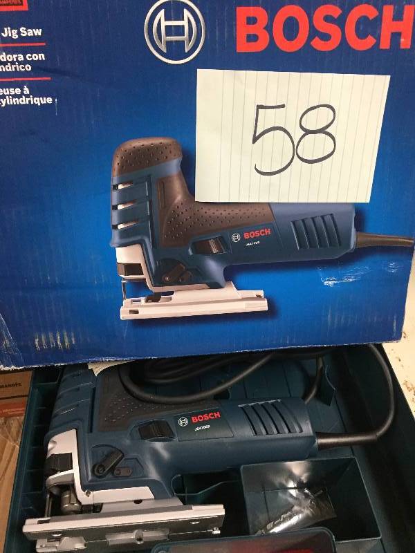 lot 58 image: Bosch 7 Amp Corded Electric Variable Speed Barrel-Grip Jig Saw with Carrying Case New