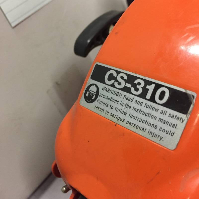 lot 109 image: ECHO 14 in. 30.5cc Gas Chainsaw  missing cover blande in chain used in working conditions