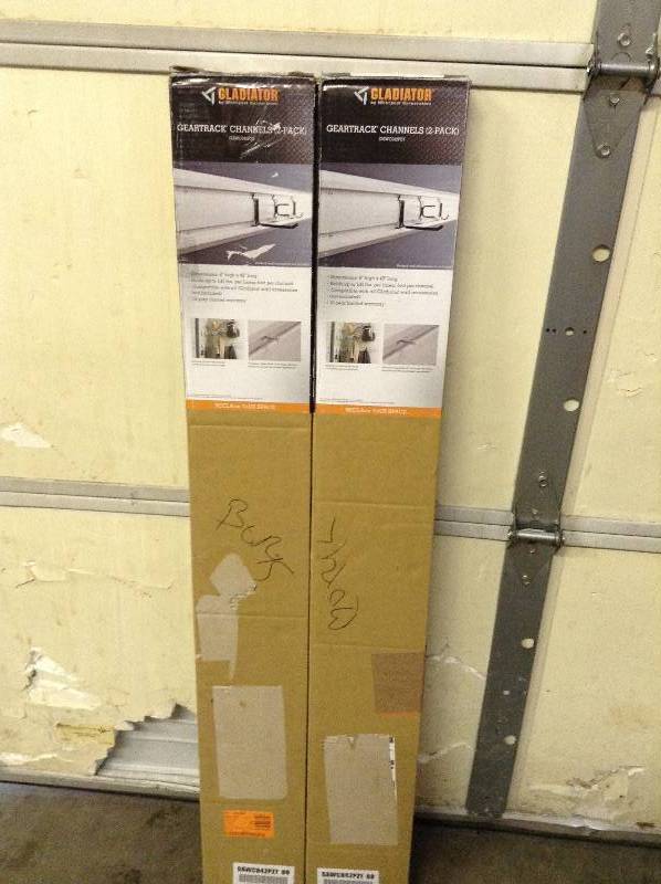 lot 137 image: Set of 2  Gladiator 48 in. W Garage Wall Storage GearTrack Channel (2-pack)