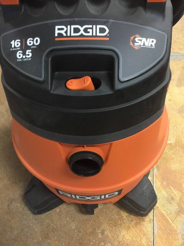 lot 166 image: RIDGID 16 Gal. 6.5-Peak HP Wet Dry Vac in like New working conditions