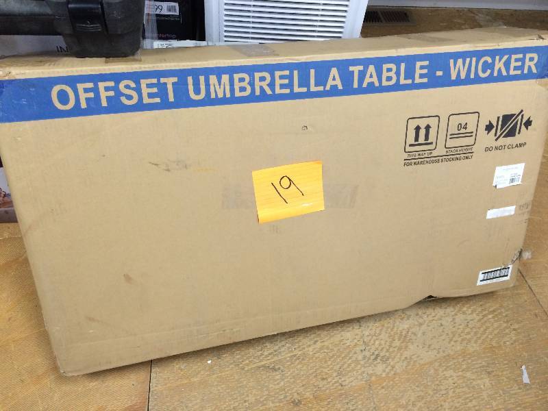 lot 19 image: Garden Oasis Offset Wicker Umbrella Table