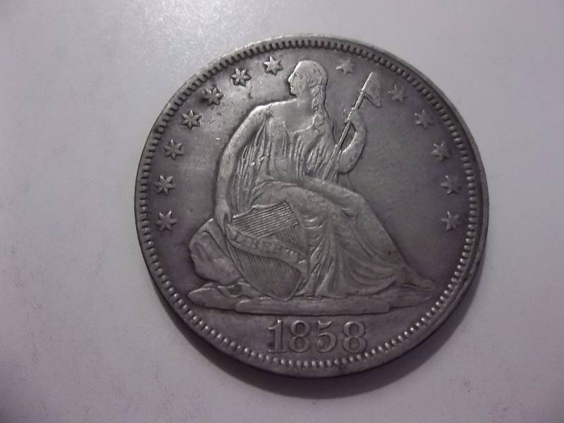 1858 Seated Liberty Half Dollar In XF (Grey Sheets Value $100.00)