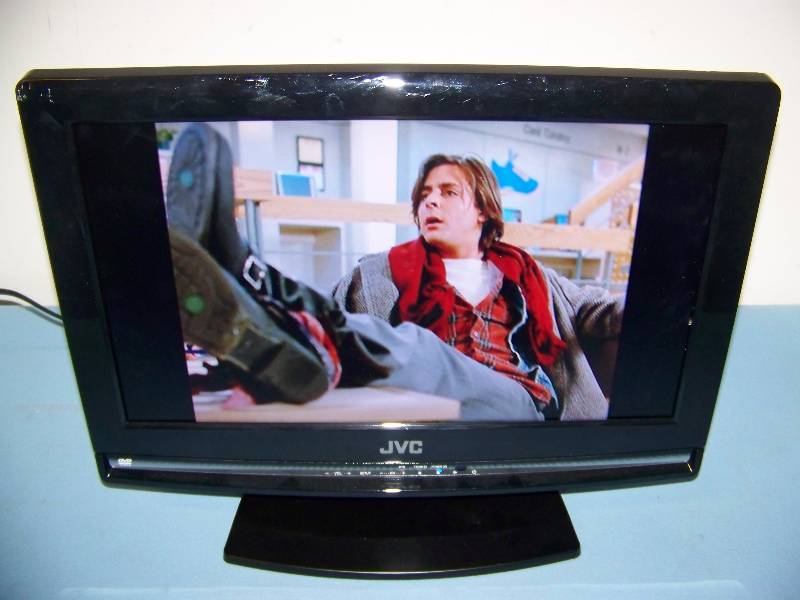 lot 10 image: 19, JVC, LCD TV  DVD Combination with Stand