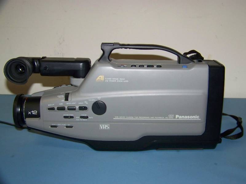 lot 88 image: Panasonic, VHS Reporter, VHS Movie Camera for Recording and Playback with AC Adapter in Hard-Sided Case and (5) VHS Tapes