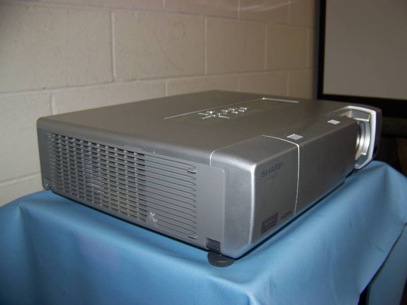 lot 11 image: Sharp, PG-D40W3D, DLP Projector with HDMI Input