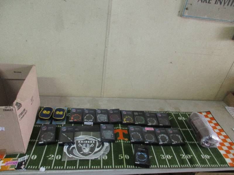 lot 64 image: assorted NFL and college football stuff