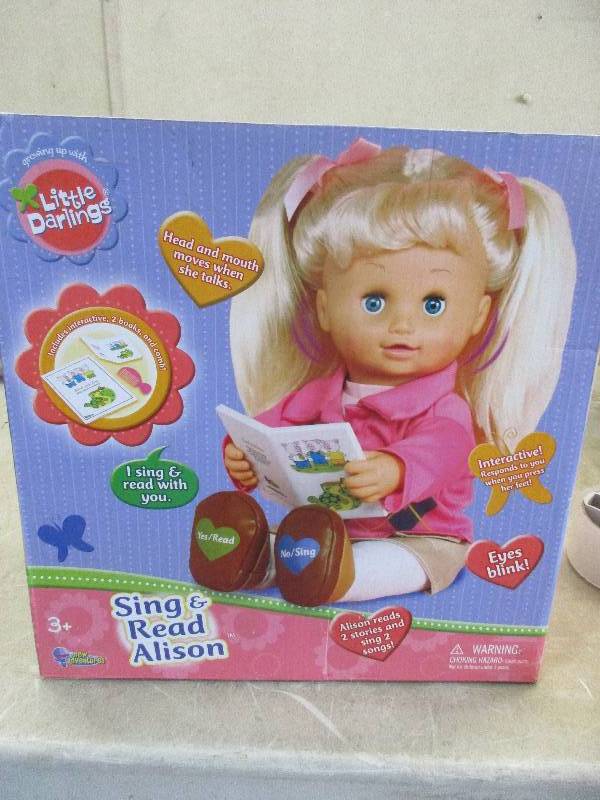 lot 77 image: little darling sing and read Alison doll