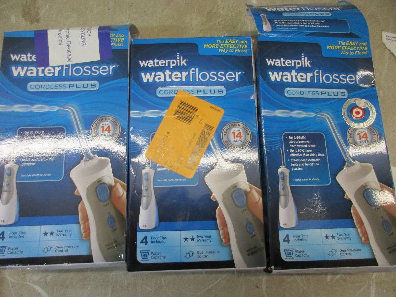 lot 114 image: 3 water pik water flossers cordless plus
