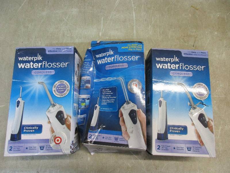 lot 115 image: 3 water pik water flossers cordless