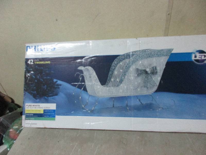 lot 132 image: Philips 42 sleigh pure white LED glitter string sleigh