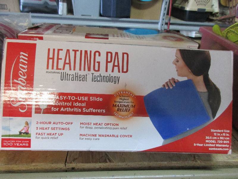 lot 13 image: 3 sunbeam heating pads