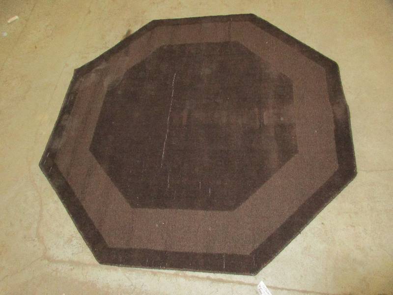 lot 51 image: pentagon rug 60 across