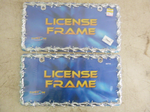 lot 69 image: 2 Barb Wire License Plate Frames