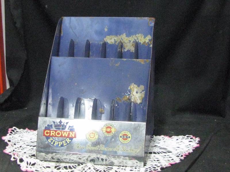 lot 72 image: Metal Crown Zipper Display Case
