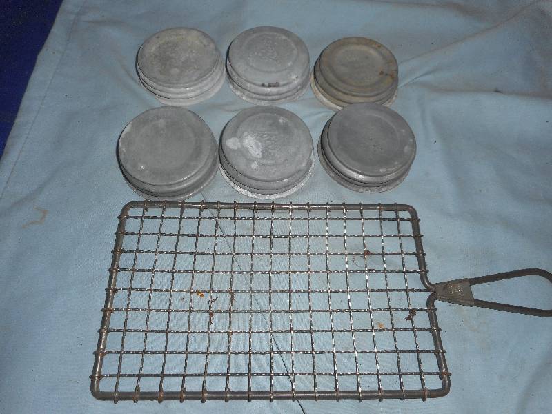 lot 11 image: 6 ANTIQUE LIDS AND STRAINER