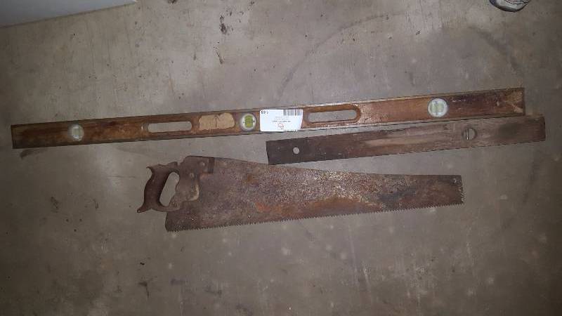 lot 149 image: 2 Antiqe levels and antique handsaw