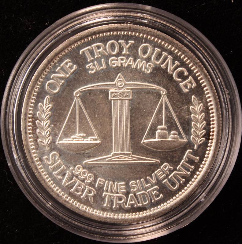 1 TROY OZ. .999 FINE SILVER 1983 MORGAN DOLLAR DESIGN IN AIRTITE HOLDER