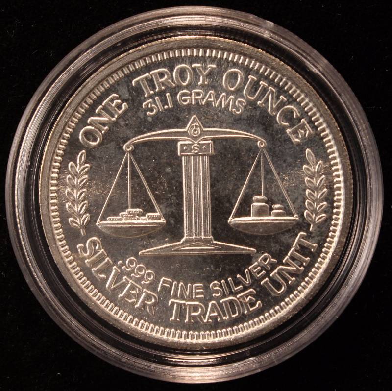 1 TROY OZ. .999 FINE SILVER 1984 MORGAN DOLLAR DESIGN IN AIRTITE HOLDER