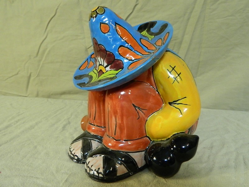 lot 17 image: Handpainted Mexican Man