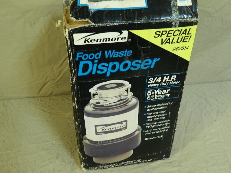 lot 73 image: New Kenmore 34 HP Garbage Disposal