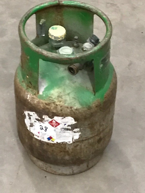 lot 28 image: Partial-Full 20# LP-Tank For A Fork...