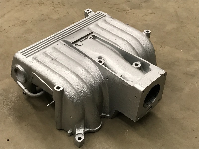 lot 65 image: Unused Ford 5.0Liter Upper Manifold...