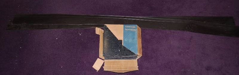 lot 73 image: Rubber Baseboard and Tiles