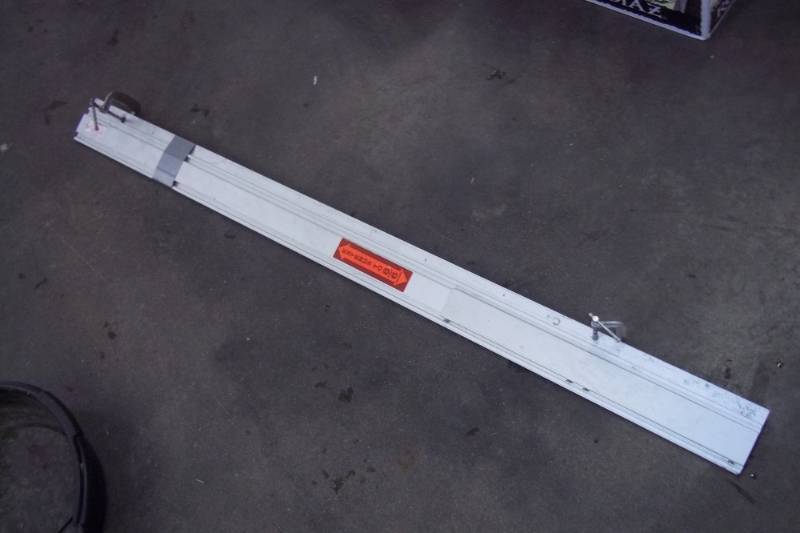 lot 43 image: Extendable straight edge extends up to 8 feet