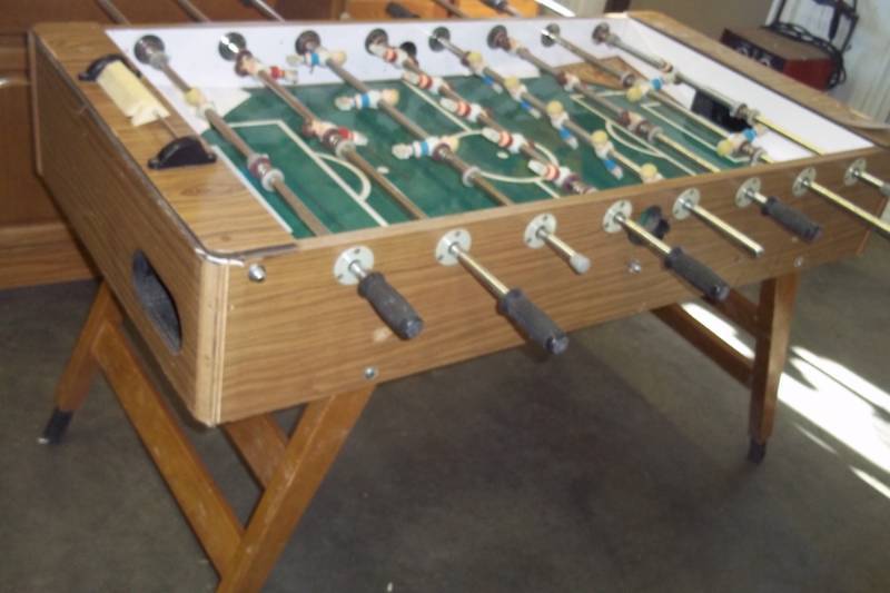 lot 16 image: Foosball table needs extra bolts in legs field and men in good condition with 2 balls 55 x 28 x 32