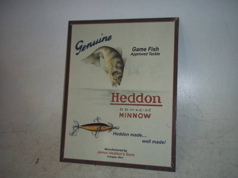 lot 50 image: Heddon Lures fishing sign 16 x 12