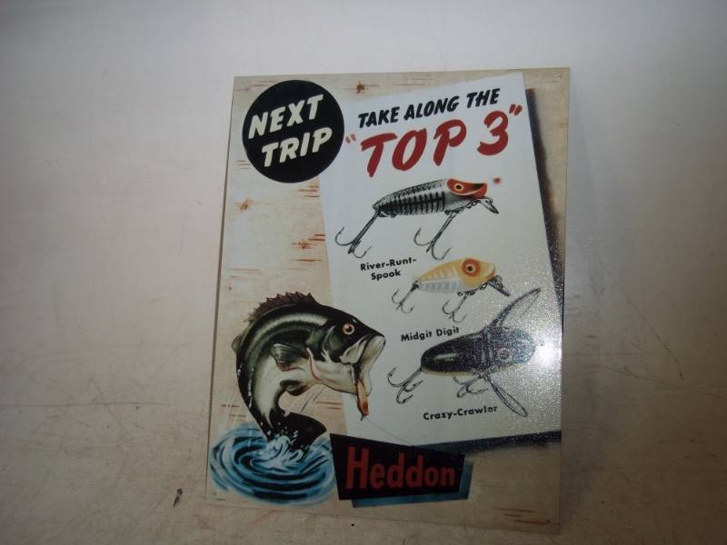 lot 51 image: Heddon Lures fishing sign 16 x 12