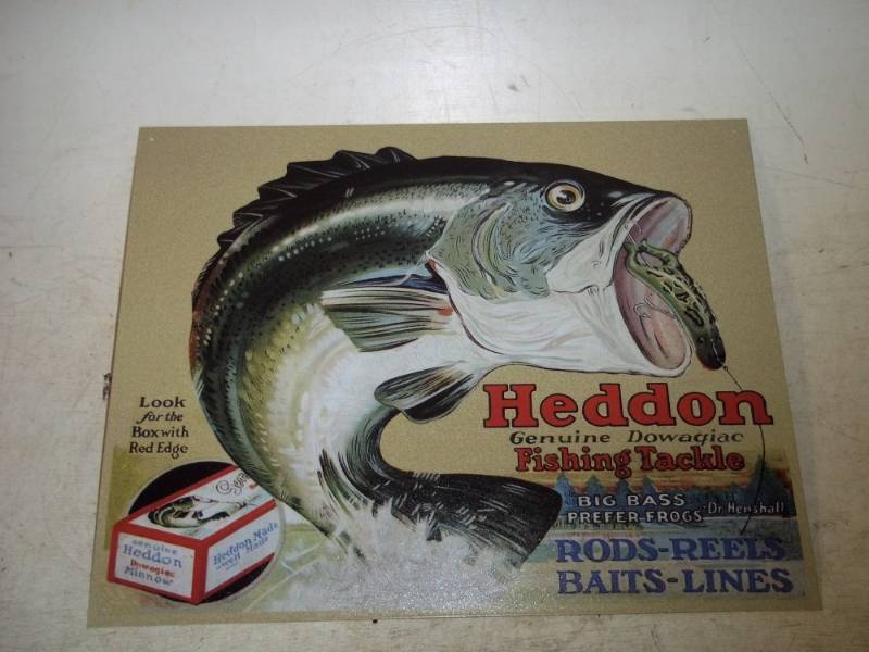 lot 52 image: Heddon Lures fishing sign 16 x 12
