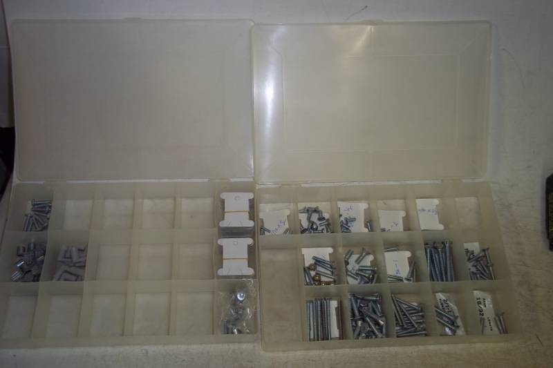 lot 148 image: Assorted nuts and bolts with 2 storage containers