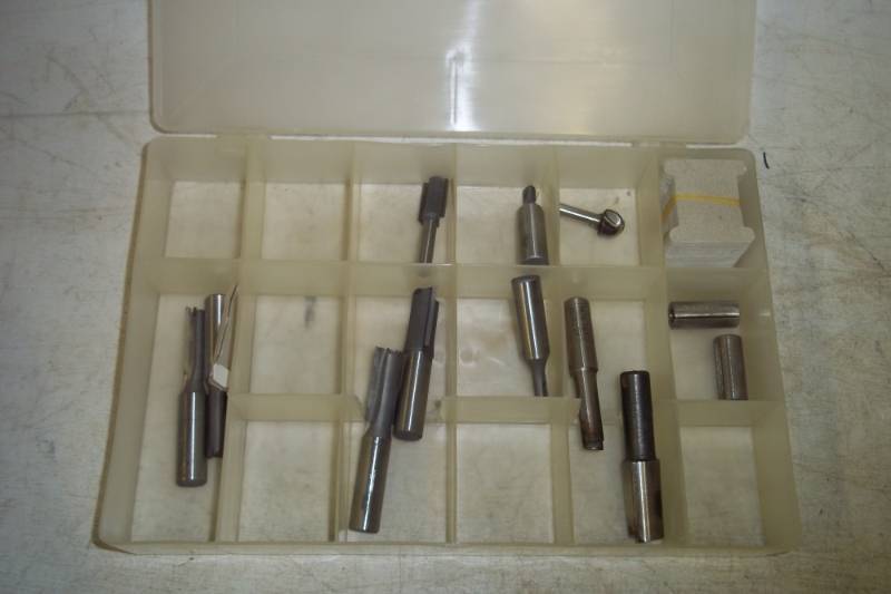 lot 150 image: Shaper bits with storage container