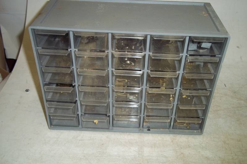 lot 151 image: 25 Drawer storage cabinet filled with hinges and hinge parts 11 x 8 x 5