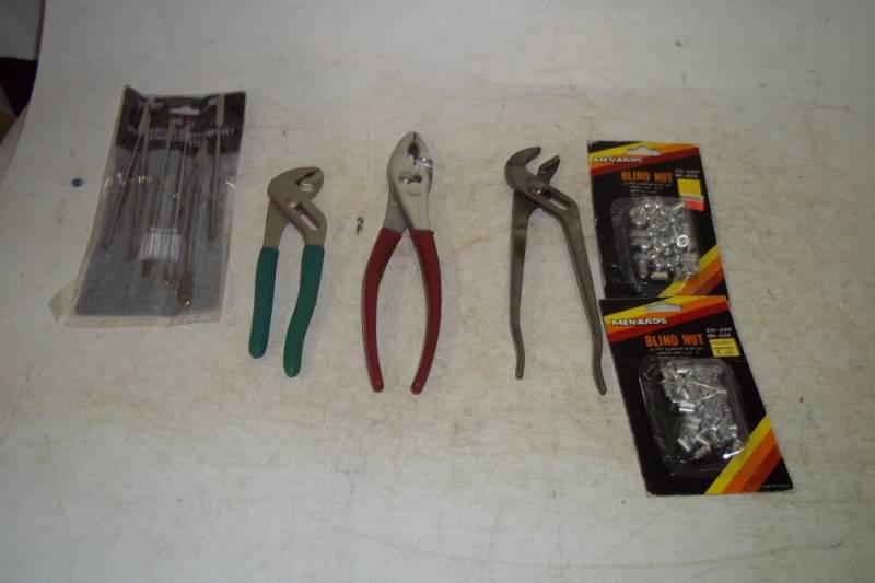 lot 154 image: 6 Piece miniature stainless steel putty knife set, pliers, 2 packages of blind nuts