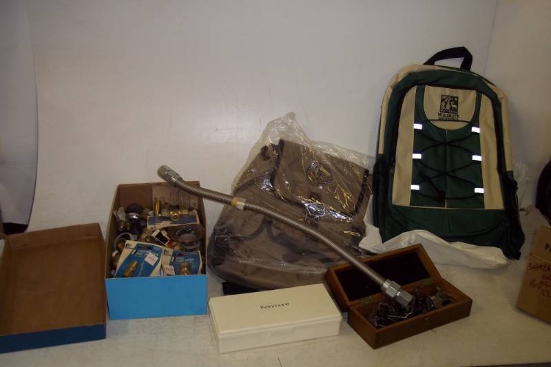 lot 160 image: Backpacks, plumbing supplies, gasoline, sewing machine parts