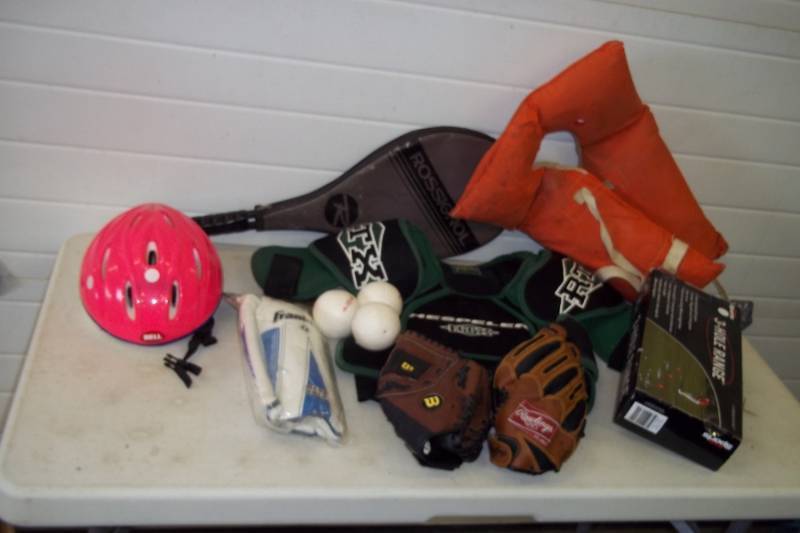 lot 115 image: Outdoor entertainment, softball gloves, shin pads and more