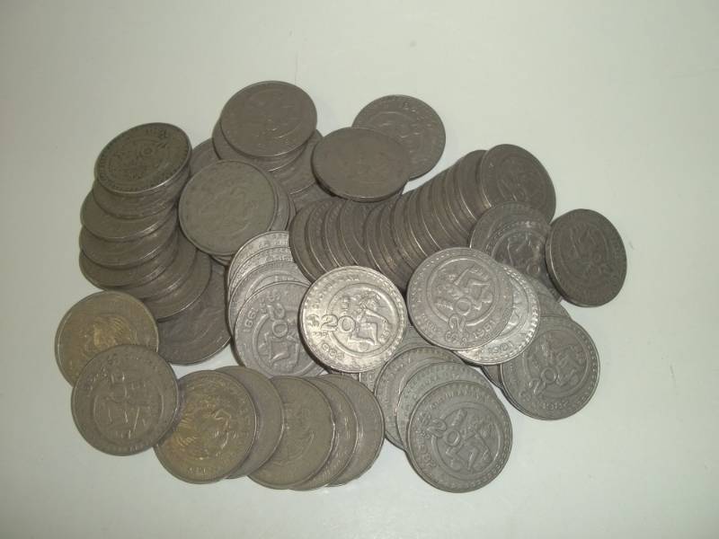 lot 7 image: Sixty Two $20 Pecos Mexican coins, mixed dates