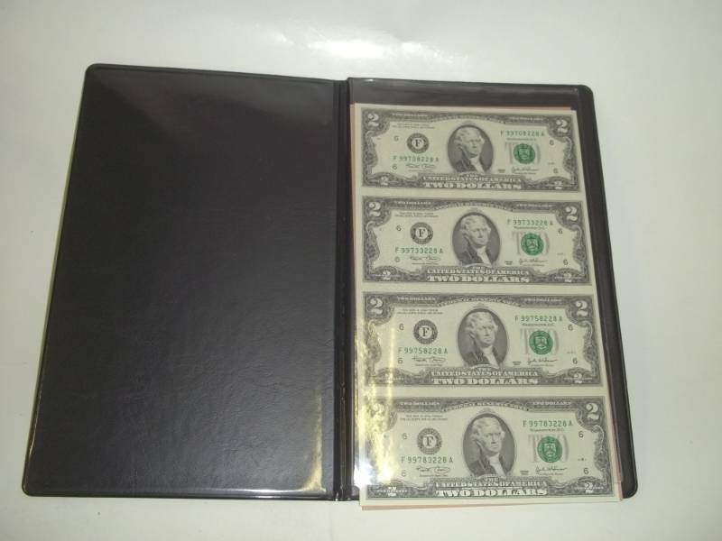 lot 10 image: Uncut sheet of $2 bills dated 2003