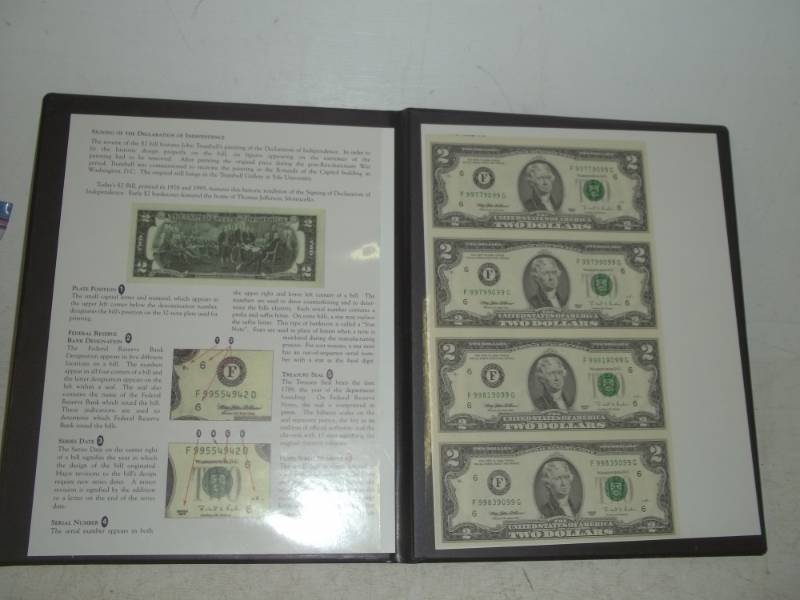 lot 17 image: Uncut sheet of $2 bills dated 1995