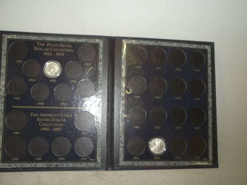 lot 20 image: Peace and American Eagle Silver Dollar collection with 2 coins, 1925 Peace dollar and 2005 Silver Eagle
