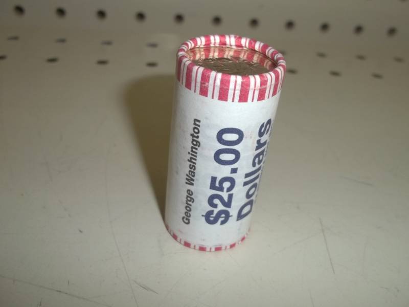 lot 83 image: Roll 25$ George Washington Dollars