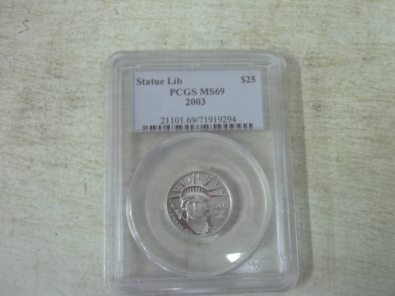 lot 2 image: Platinum $25 2003 Eagle PCGS MS 69 14 oz. Platinum .9999