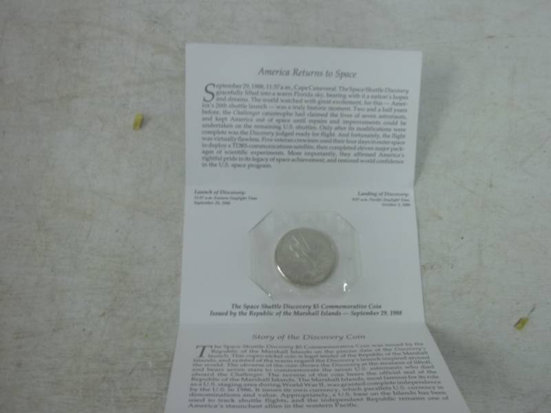 lot 97 image: Story of Space Shuttle Discovery $5 commemorative coin