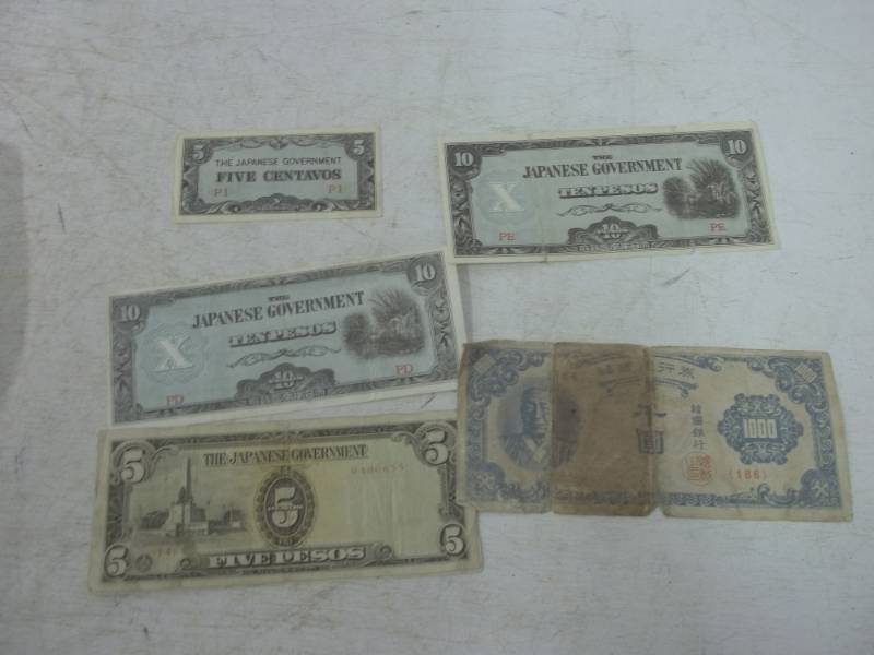 lot 99 image: Japanese and Korean currency