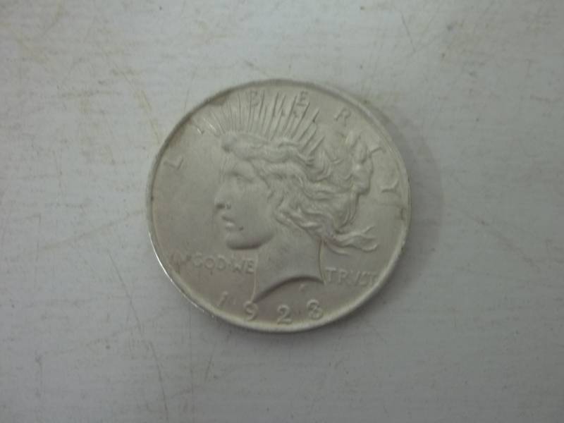 lot 104 image: 1923 Peace Silver Dollar %90 silver